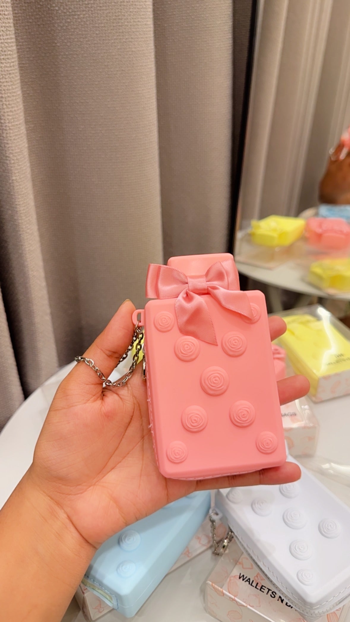 Perfume bottle coin pouches