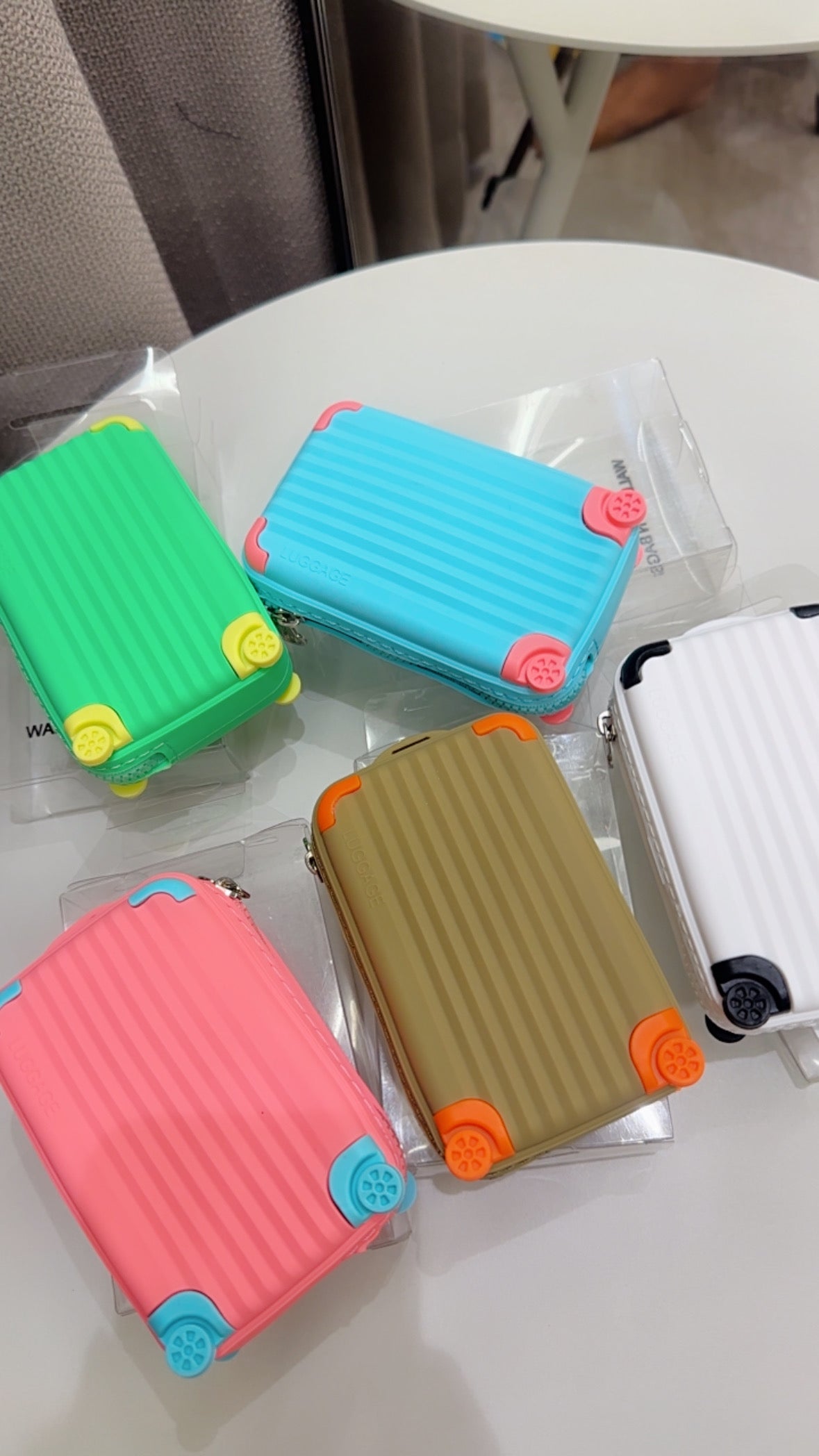 Suitcase coin pouches