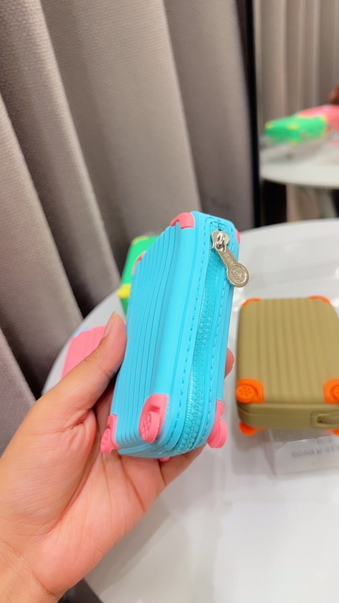 Suitcase coin pouches