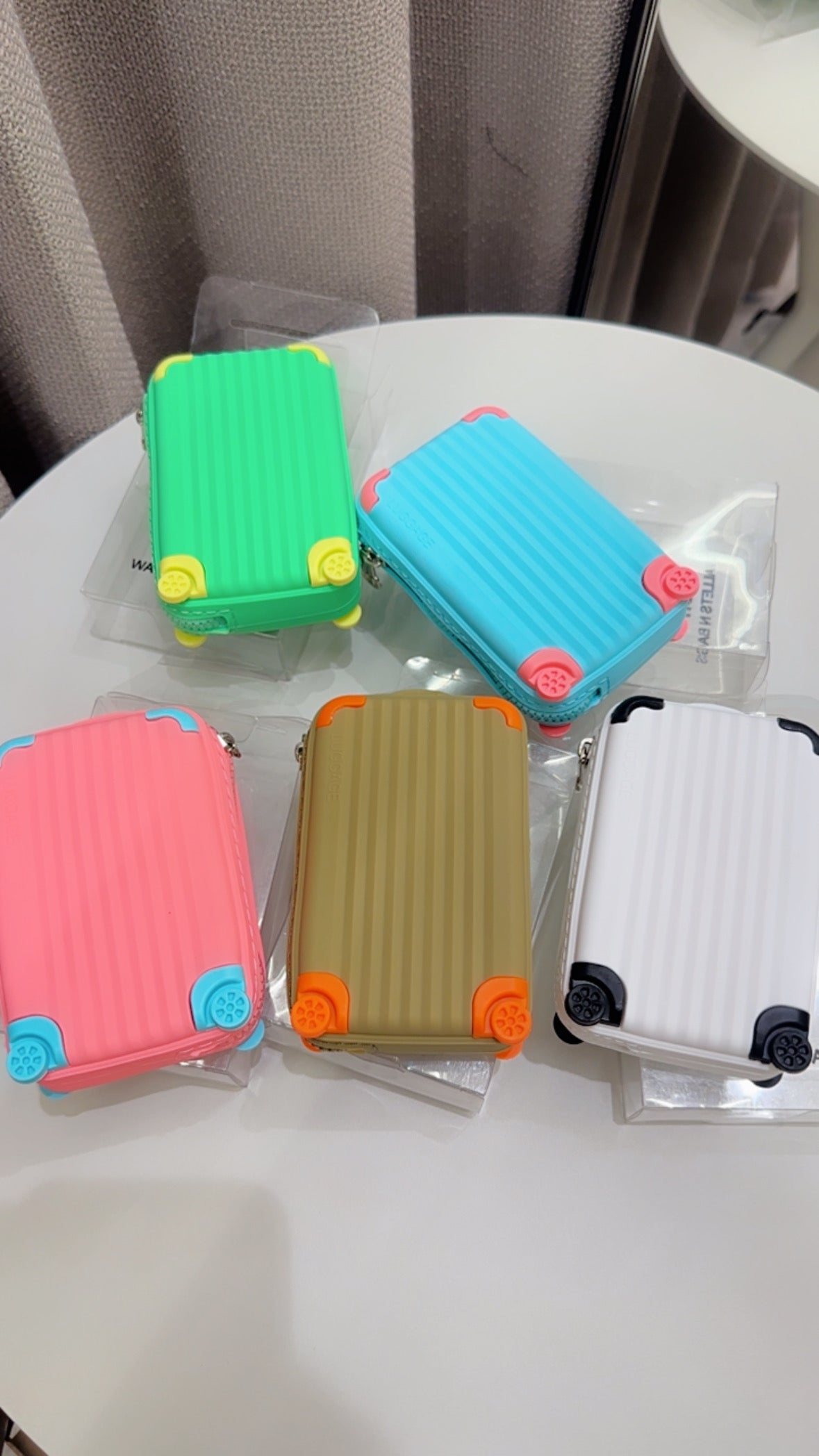 Suitcase coin pouches